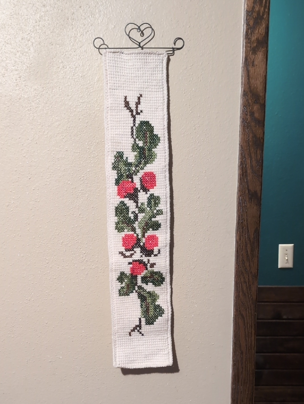 Handmade White Cross-Stitch Wall Hanging with Green Leaves and Red Berries